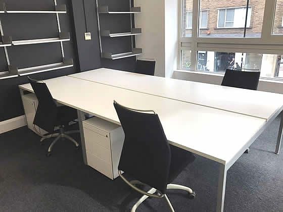 1600mm Fantoni OT White bench desks with silver goalpost legs available configured as 2-person benches.
