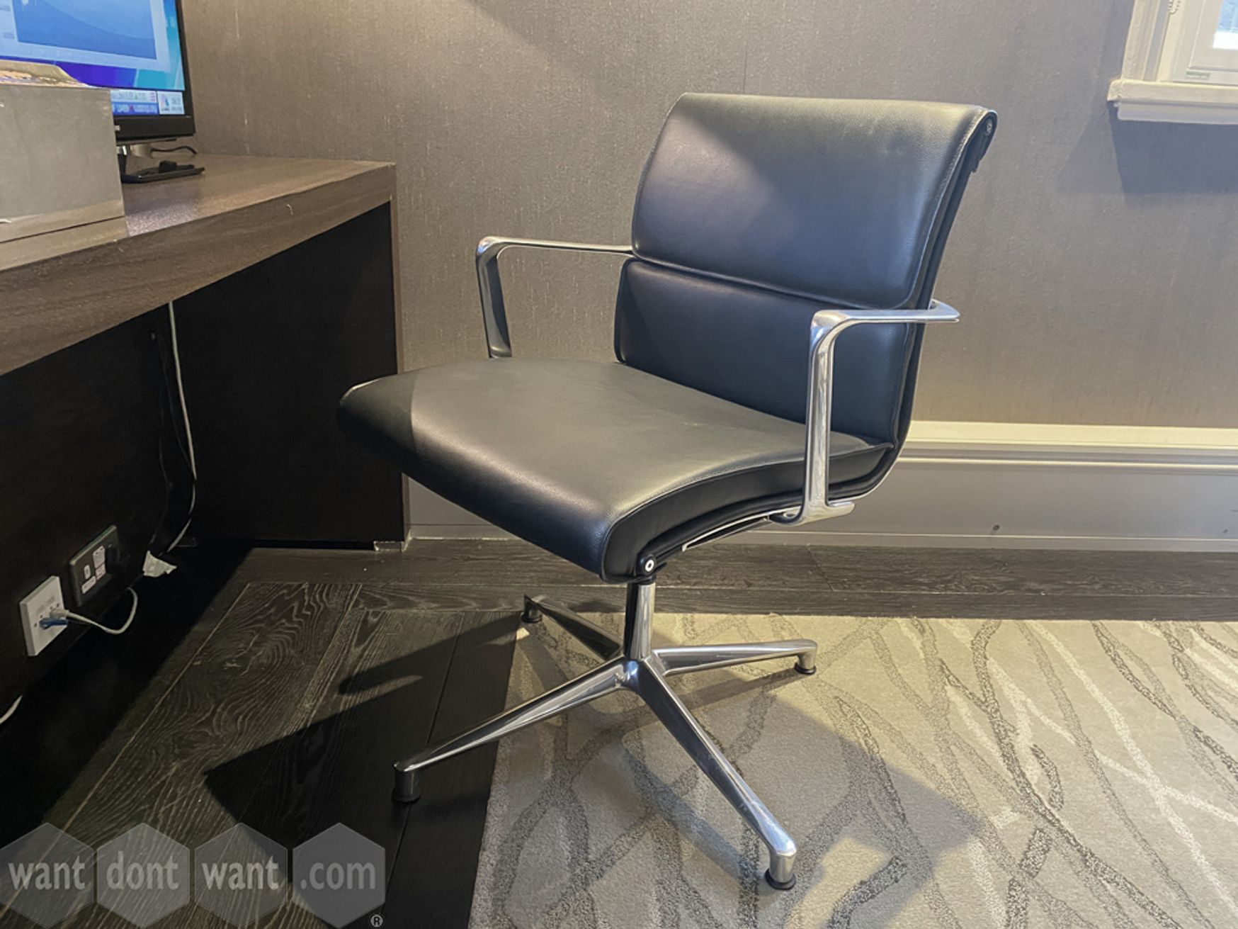 Used ICF black leather meeting chair on glides. Immaculate condition. 