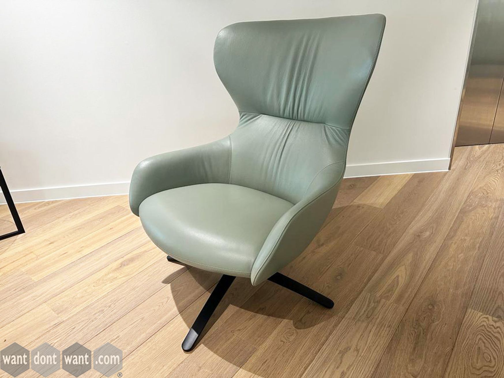 Used Boss Design 'Amelia' armchair in green leather