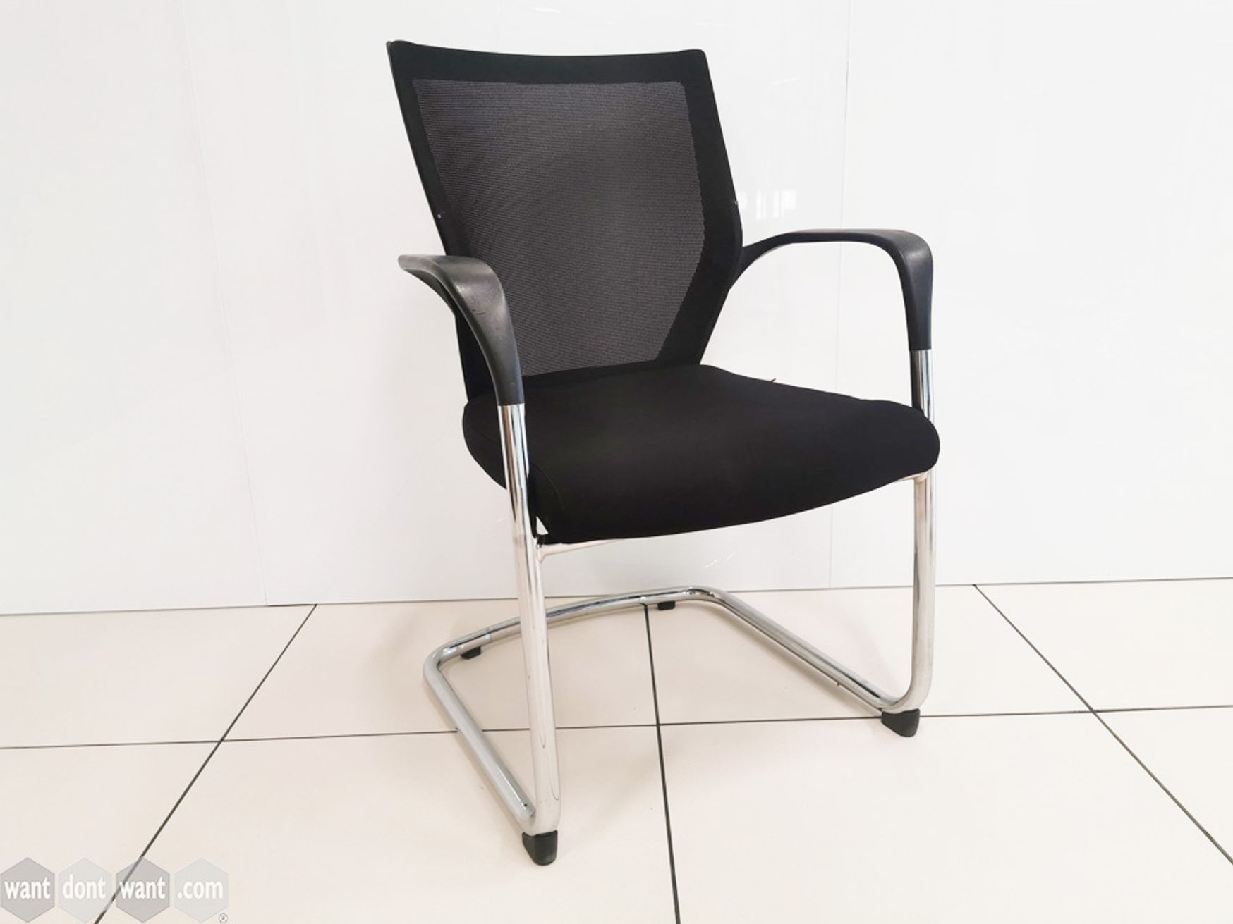Techo Sidiz meeting chairs with mesh backs and black upholstered seat.