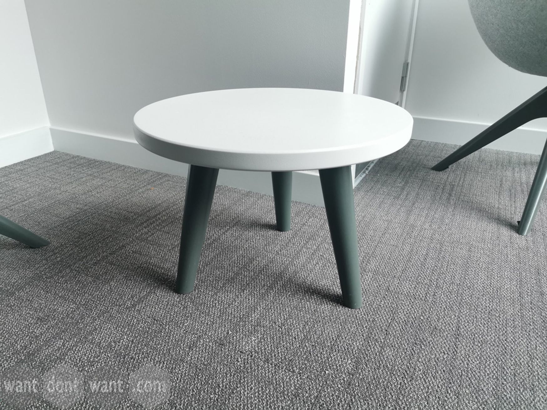 Used Sixteen3 Coffee table with white top and grey legs.