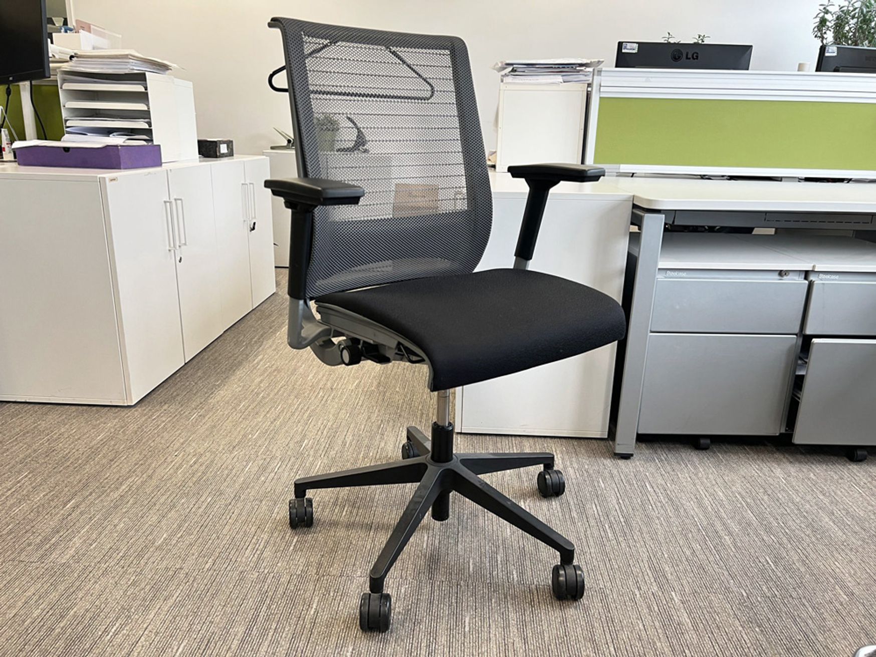 Excellent used Steelcase 'Think V1' task chairs with Mesh back and black upholstered seat.
