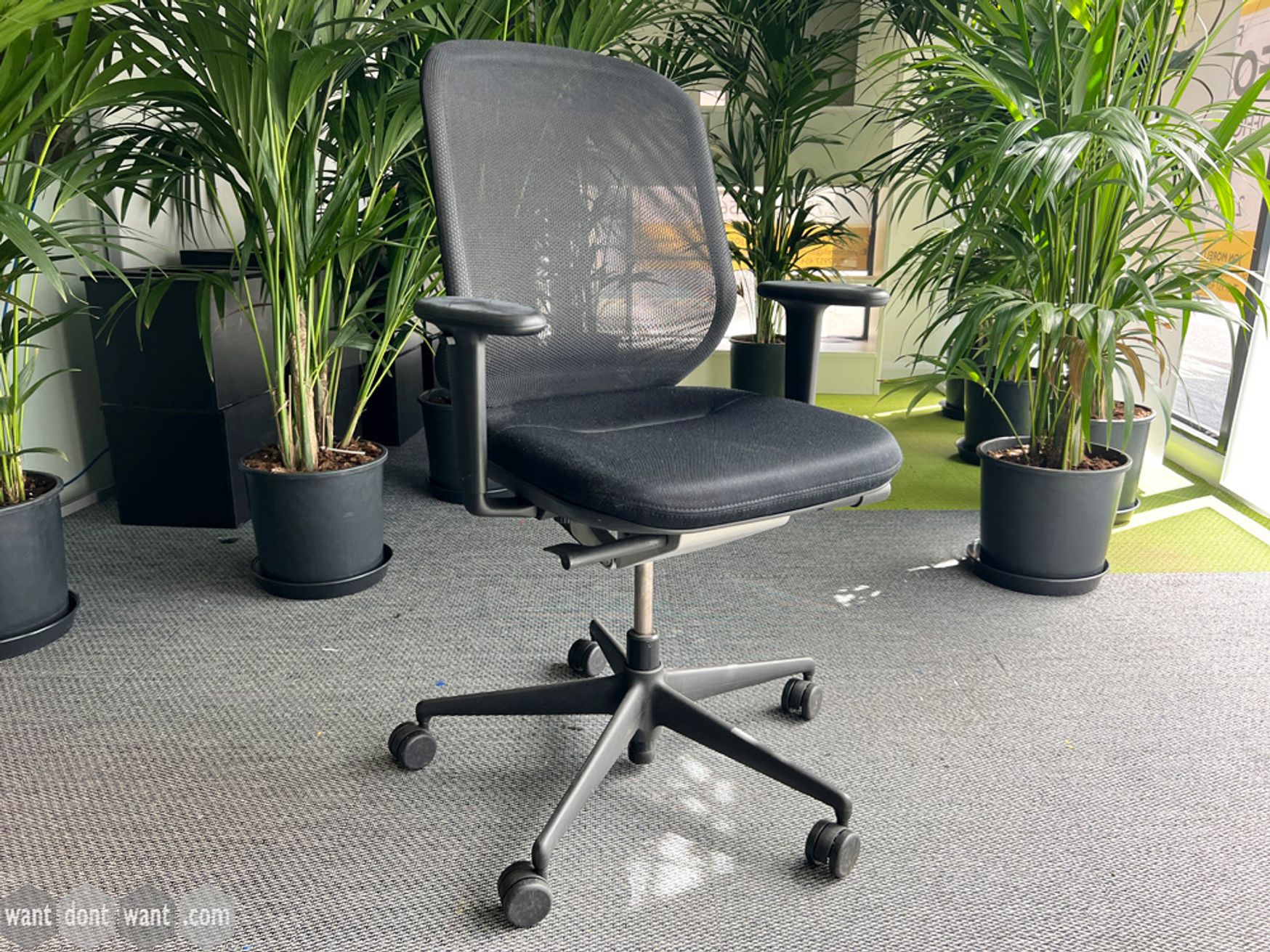 Used Vitra 'Medapal' task chairs with black upholstered seat and mesh back.