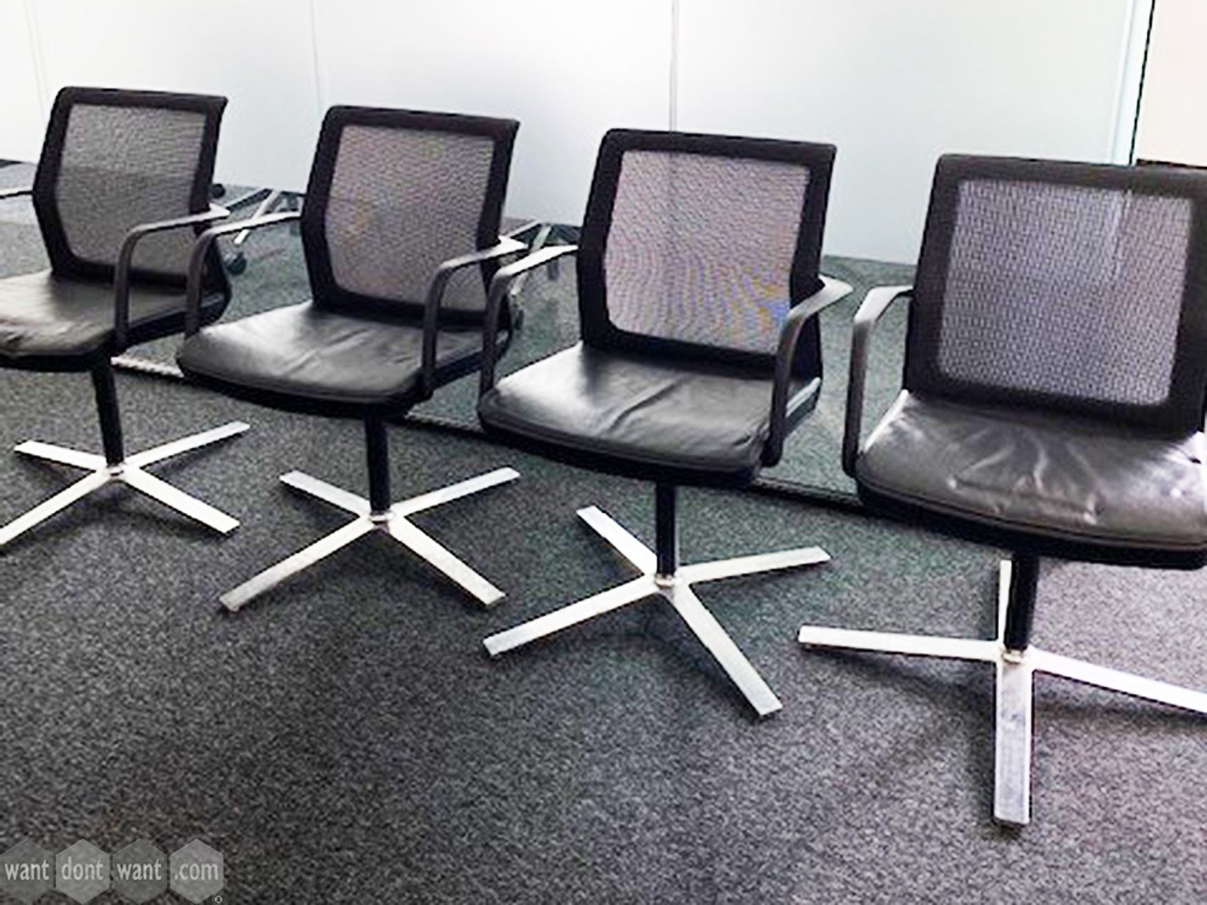 Used Orangebox 'Workday' meeting chairs with black leather seats