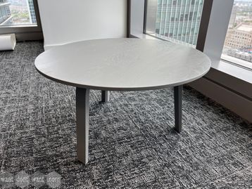 Used grey veneer coffee table