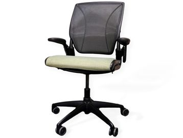 Used Humanscale 'Diffrient World' task chairs with black mesh back and soft green fabric seat.