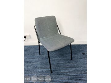 Used Workstories stacking chairs in green/blue fabric