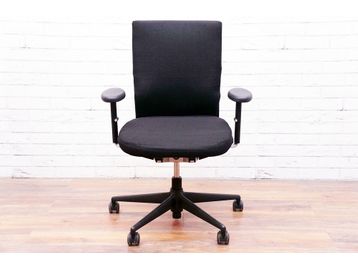 Vitra Axess fully adjustable task chair upholstered in black fabric with black base.