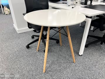 Used 800mm white circular tables with wooden legs