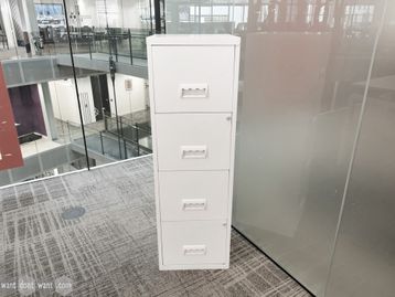 Used white 4-drawer filing cabinet