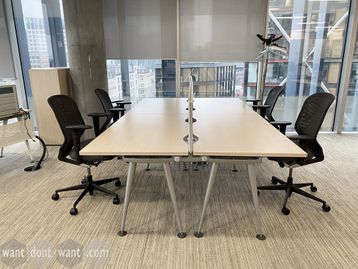 Used Herman Miller 'Abak' bench desks with maple tops and silver legs