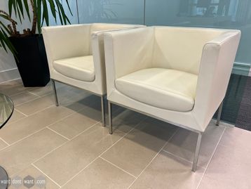 Used Orangebox 'Drift' chairs upholstered in high-grade cream hide with chrome legs.