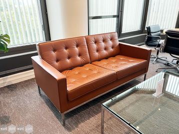Used (original) Florence Knoll Sofa manufactured by Knoll. Upholstered in tan hide.
