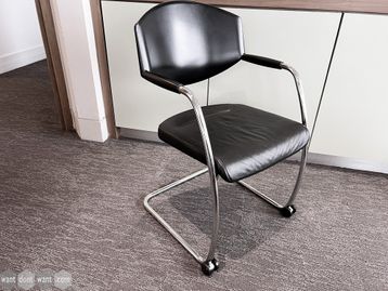 Used Orangebox/Giroflex meeting chairs with black leather seats and front castors for easy movement.