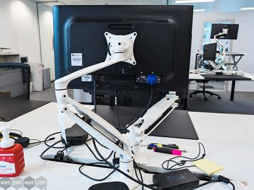 Used white single monitor arms 