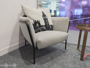 Used Habitat armchair in grey fabric and black legs