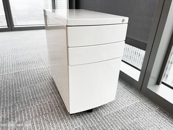 Used slim white under-desk 3-drawer mobile pedestals.