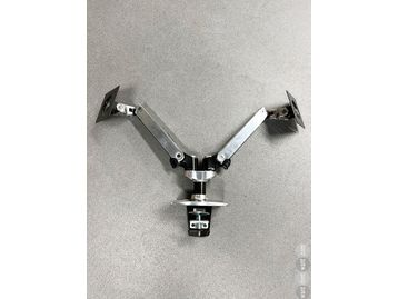 Used 'Ergotron' dual monitor arm with desk clamp fixing.