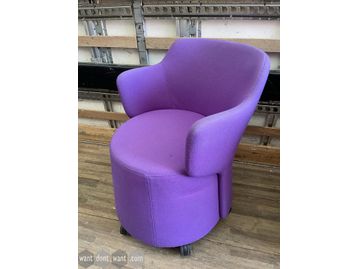 Used Orangebox 'Skomer' chair upholstered in purple fabric.