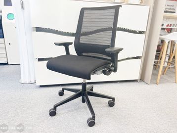 Second-user Steelcase 'Think' chair V1. Mesh back with black upholstered seat.