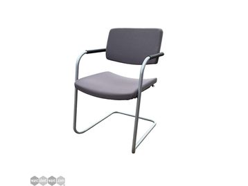 Used Verco stacking chair in grey.