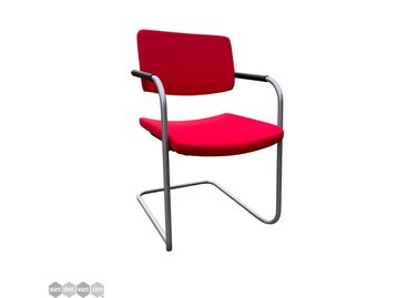 Used Verco stacking chair in red.
