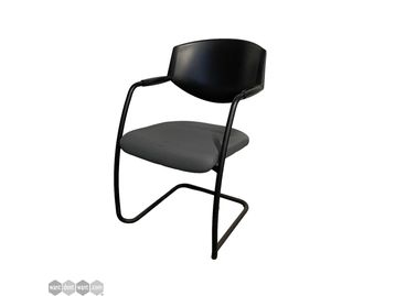 Used Giroflex/Orangebox stacking chair in black with grey upholstered seat.